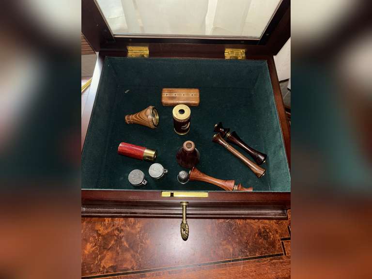 Opera glasses with mother of pearl, and display case full of Van Cort kaleidoscope, other kaleidosco