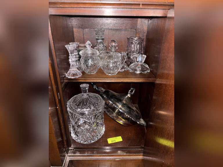 2 shelves of glassware and silver plate