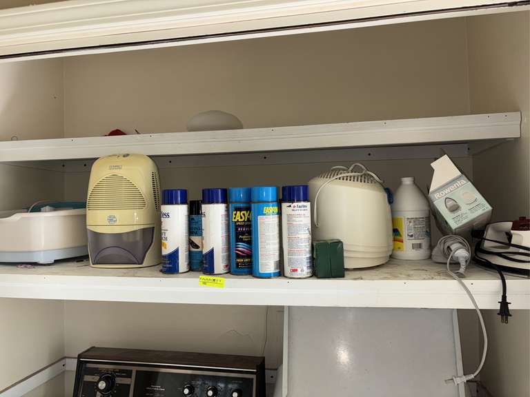 Contents of second shelf (startch sprays, dehumidifier, etc)