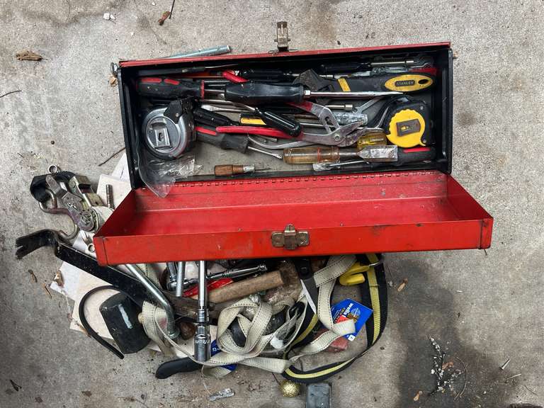 Toolbox with hand tools, straps, and floor tiles