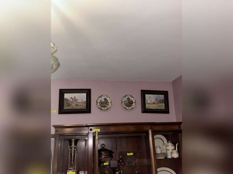 2 framed horse jockey paintings and decorative plates