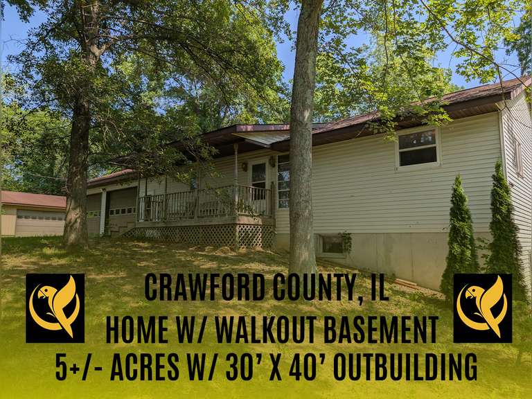 Home with Walk-Out Basement & Outbuildings on 5+/- Acres