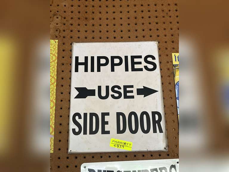 Hippies use side door metal sign