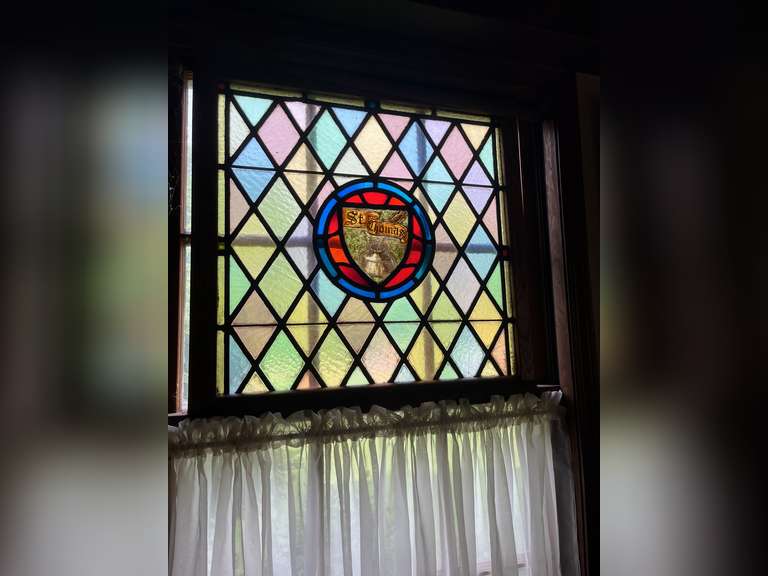 St. Thomas stained glass piece