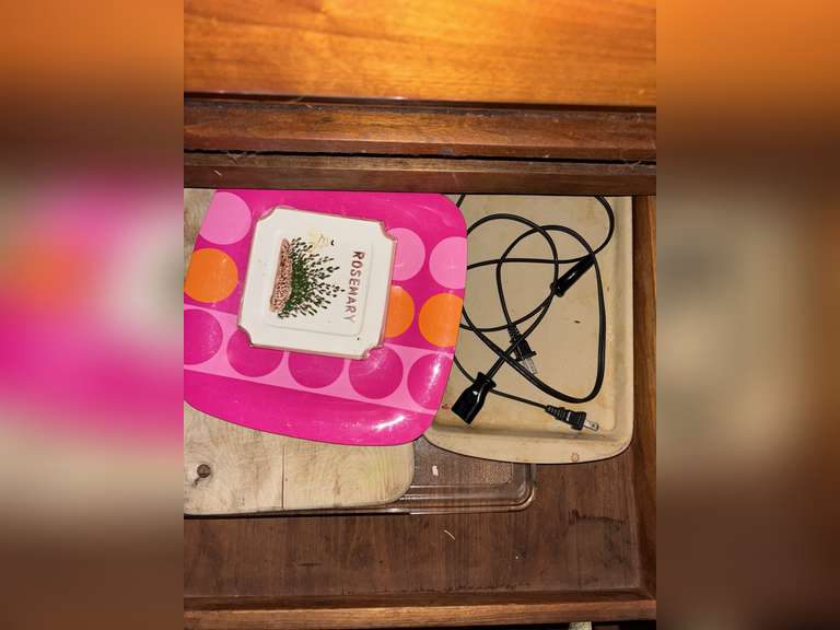Contents of cabinet under stovetop