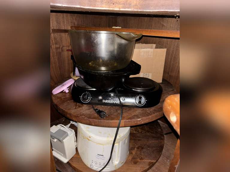 Contents of Lazy Susan ( popcorn popper, T-Fal maxi-fry deep fryer, etc)