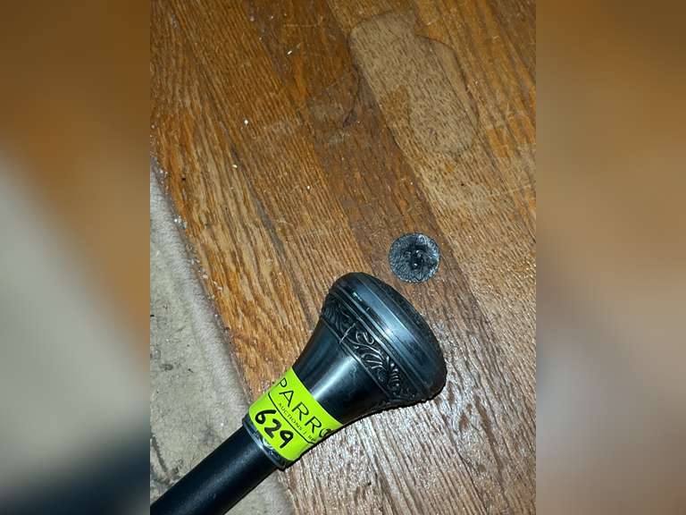 Knife in handle spring loaded walking cane with wolf design and etchings (wolf piece needs reattache