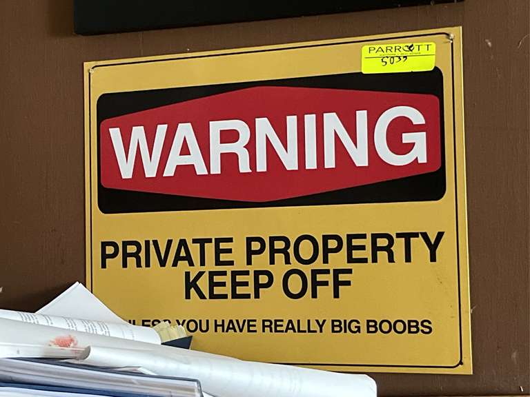 “Warning” metal sign