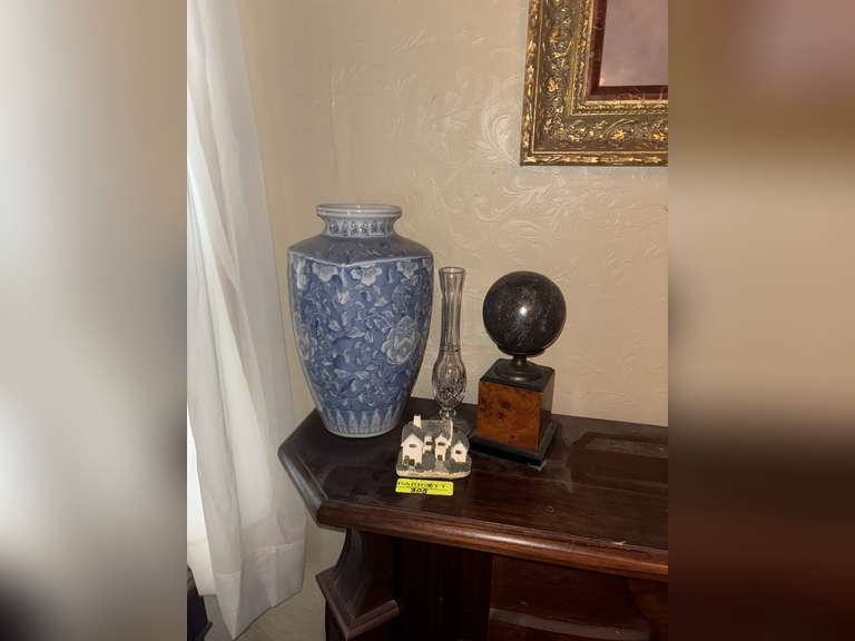 Large floral vase, heavy decorative sphere, glass Waterford vase, and small house decoration