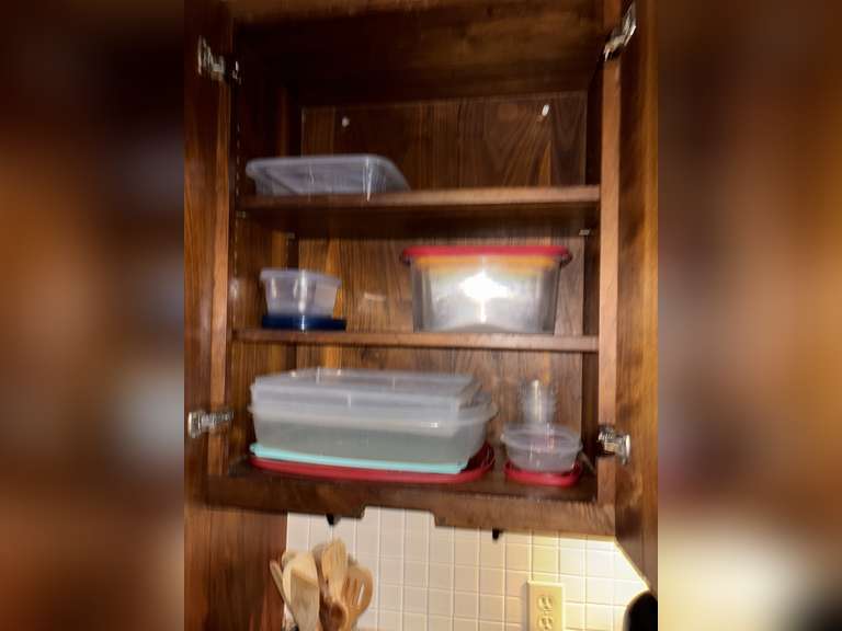 Contents of cabinet (tupperware)