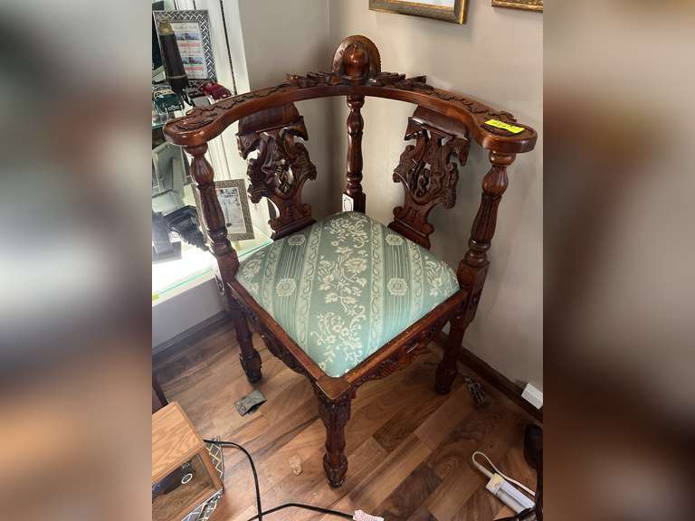 Corner chair with carved splats