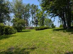 Home with Walk-Out Basement & Outbuildings on 5+/- Acres