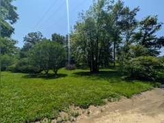 Home with Walk-Out Basement & Outbuildings on 5+/- Acres