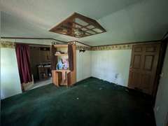 Home with Walk-Out Basement & Outbuildings on 5+/- Acres