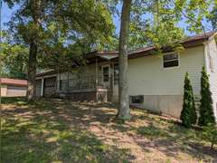 Home with Walk-Out Basement & Outbuildings on 5+/- Acres