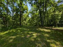 Home with Walk-Out Basement & Outbuildings on 5+/- Acres