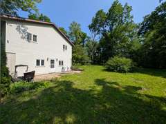 Home with Walk-Out Basement & Outbuildings on 5+/- Acres