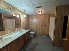 Home with Walk-Out Basement & Outbuildings on 5+/- Acres