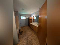 Home with Walk-Out Basement & Outbuildings on 5+/- Acres