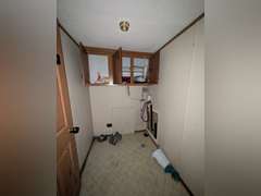 Home with Walk-Out Basement & Outbuildings on 5+/- Acres