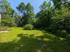 Home with Walk-Out Basement & Outbuildings on 5+/- Acres