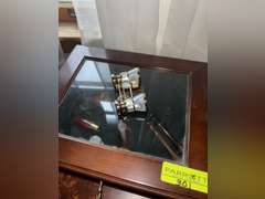 Opera glasses with mother of pearl, and display case full of Van Cort kaleidoscope, other kaleidosco
