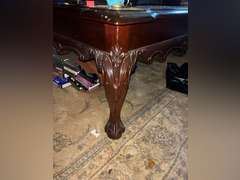 Large coffee table with carved legs