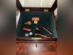 Opera glasses with mother of pearl, and display case full of Van Cort kaleidoscope, other kaleidosco