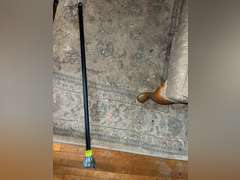 Knife in handle spring loaded walking cane with wolf design and etchings (wolf piece needs reattache