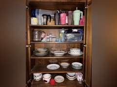 Contents of cabinet (tumblers, bowls, plates)