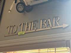 To The Bar Brass sign