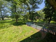Home with Walk-Out Basement & Outbuildings on 5+/- Acres