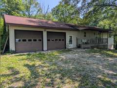 Home with Walk-Out Basement & Outbuildings on 5+/- Acres