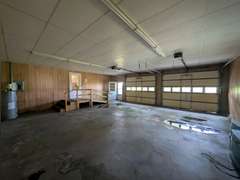 Home with Walk-Out Basement & Outbuildings on 5+/- Acres