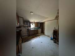 Home with Walk-Out Basement & Outbuildings on 5+/- Acres