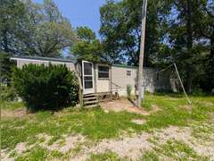 Home with Walk-Out Basement & Outbuildings on 5+/- Acres