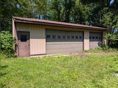 Home with Walk-Out Basement & Outbuildings on 5+/- Acres