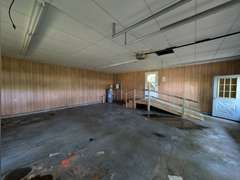 Home with Walk-Out Basement & Outbuildings on 5+/- Acres