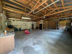 Home with Walk-Out Basement & Outbuildings on 5+/- Acres