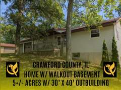 Home with Walk-Out Basement & Outbuildings on 5+/- Acres