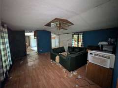 Home with Walk-Out Basement & Outbuildings on 5+/- Acres