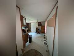 Home with Walk-Out Basement & Outbuildings on 5+/- Acres