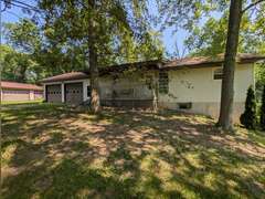 Home with Walk-Out Basement & Outbuildings on 5+/- Acres