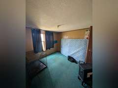 Home with Walk-Out Basement & Outbuildings on 5+/- Acres