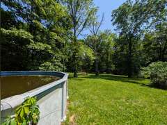 Home with Walk-Out Basement & Outbuildings on 5+/- Acres