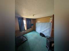 Home with Walk-Out Basement & Outbuildings on 5+/- Acres