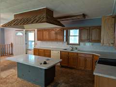 Home with Walk-Out Basement & Outbuildings on 5+/- Acres