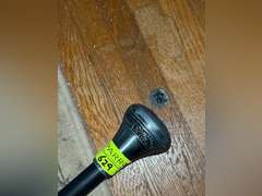 Knife in handle spring loaded walking cane with wolf design and etchings (wolf piece needs reattache