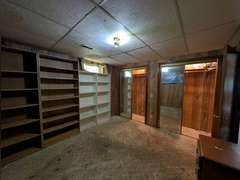 Home with Walk-Out Basement & Outbuildings on 5+/- Acres