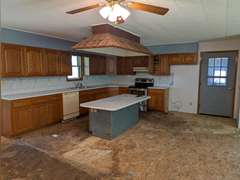 Home with Walk-Out Basement & Outbuildings on 5+/- Acres